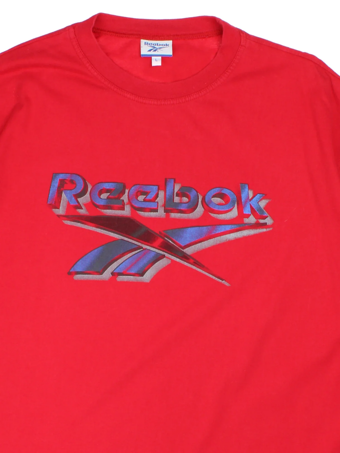 Vintage Reebok T-Shirt in a red colourway with the logo printed across the front.