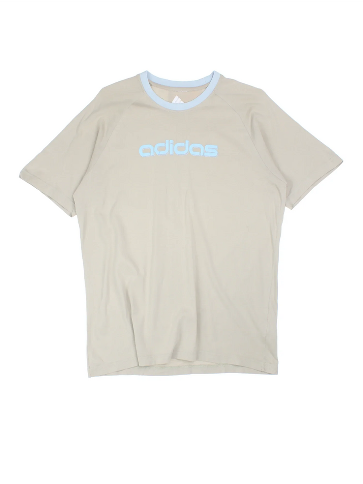 Adidas T-Shirt in a tan colourway with the logo printed on the front.
