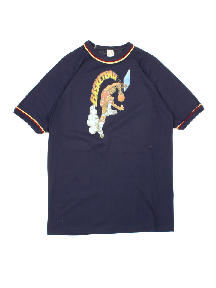 Vintage 70's Basketball Ringer T-Shirt in a blue colourway with a cartoon basketballer graphic on the front.