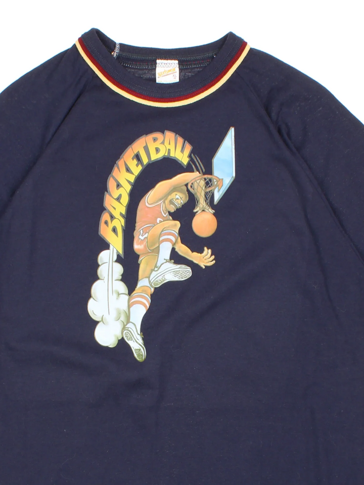 Vintage 70's Basketball Ringer T-Shirt in a blue colourway with a cartoon basketballer graphic on the front.