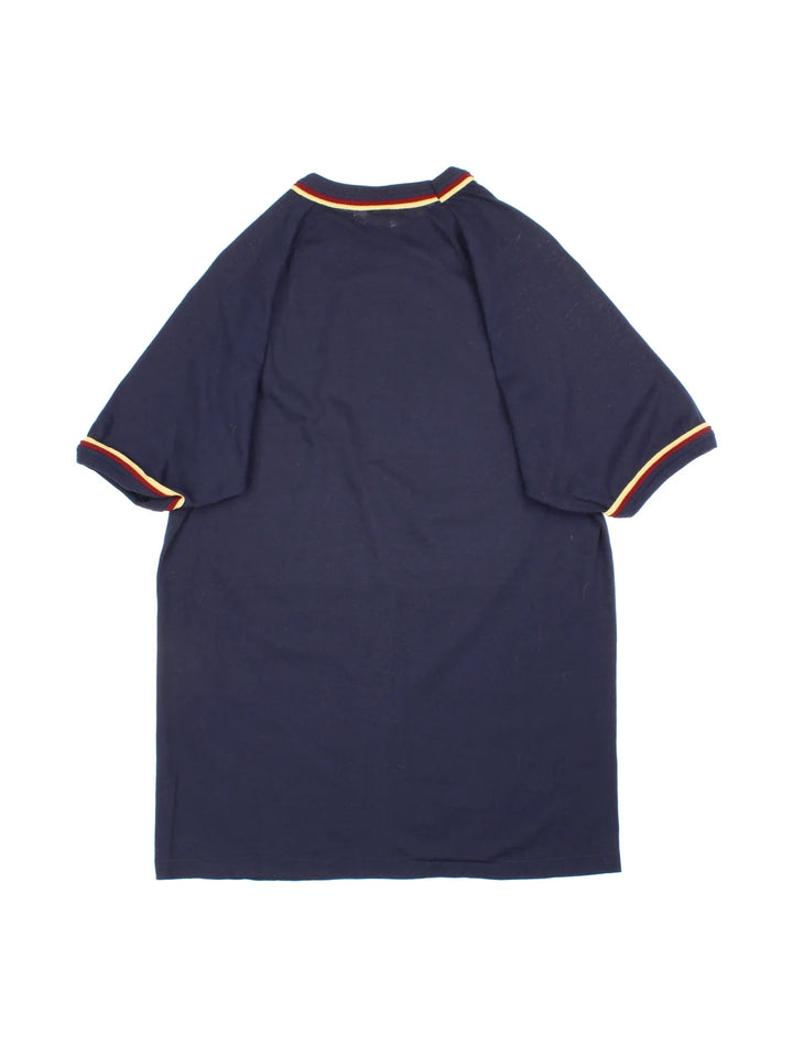 Vintage 70's Basketball Ringer T-Shirt in a blue colourway with a cartoon basketballer graphic on the front.