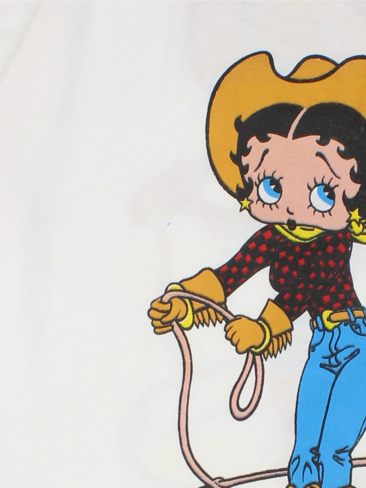 Vintage 90's Betty Boop Cowgirl Graphic Single Stitch T-Shirt in a white colourway with Betty Boop cowgirl Graphic printed on the front and back.