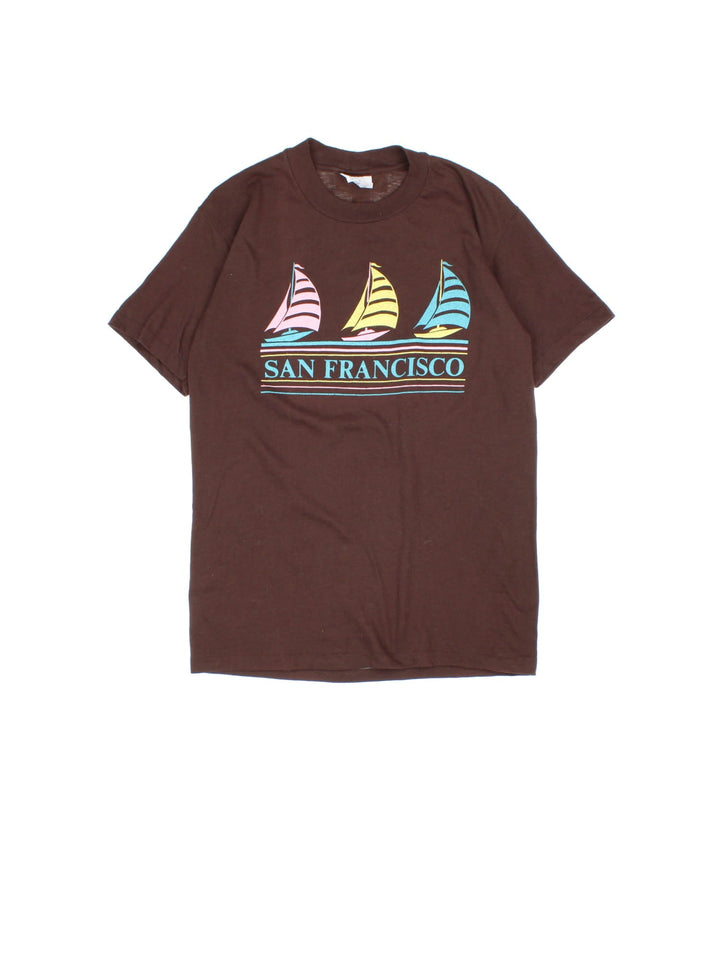 Vintage 80's San Francisco Graphic Single Stitch T-Shirt in a brown colourway with the spell out and boat graphic printed across the front.