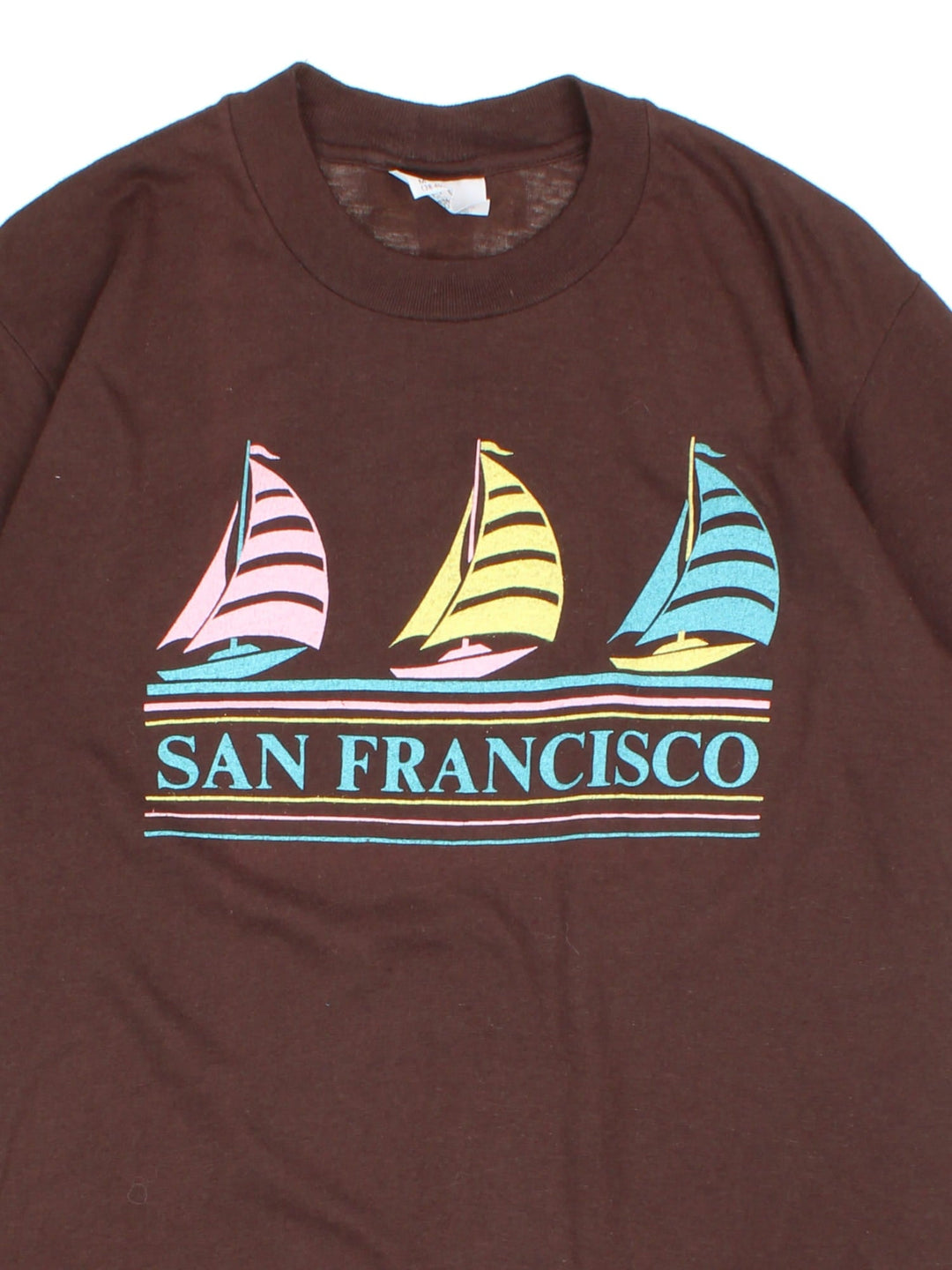 Vintage 80's San Francisco Graphic Single Stitch T-Shirt in a brown colourway with the spell out and boat graphic printed across the front.