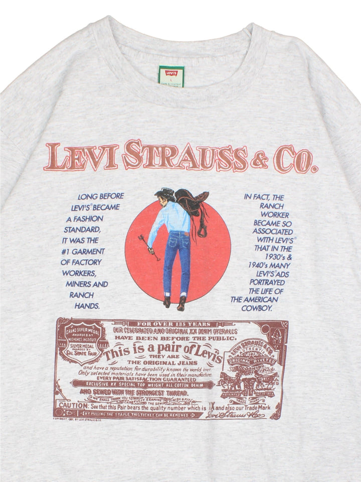 Vintage 1987 Levi Strauss Rare T-Shirt in a grey colourway with western graphic and spell out printed on the front.