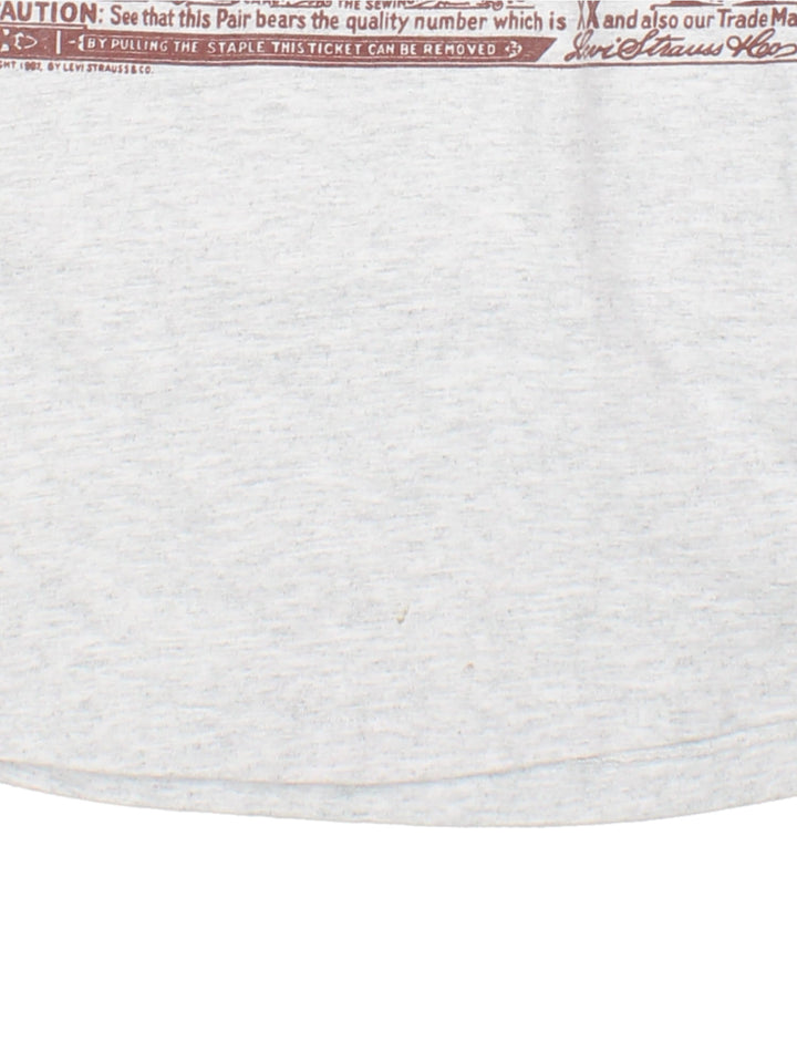 Vintage 1987 Levi Strauss Rare T-Shirt in a grey colourway with western graphic and spell out printed on the front.