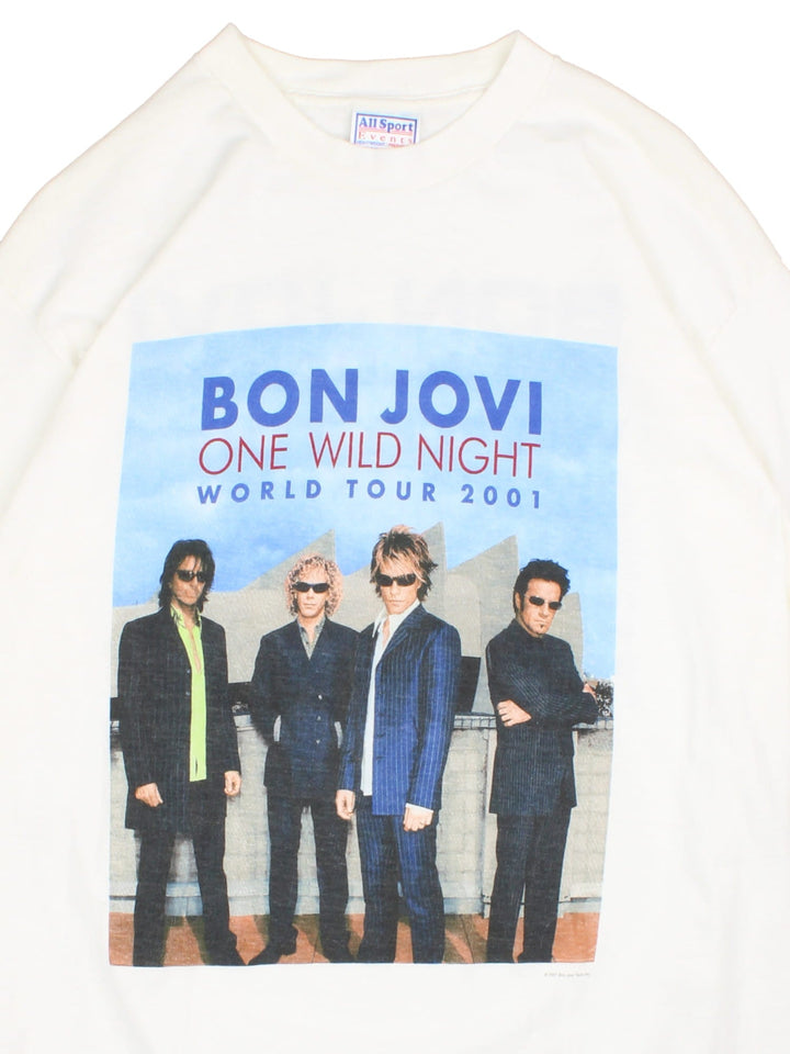 Vintage 2001 Bon Jovi One Wild Night World Tour T-Shirt in a white colourway with the band graphic print on the front and spell out and tour dated printed on the back.