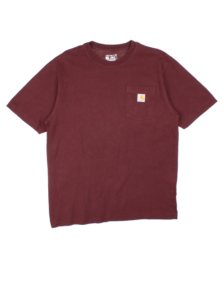 Vintage Carhartt T-Shirt in a red colourway. Chest pocket with logo embroidered on the front.