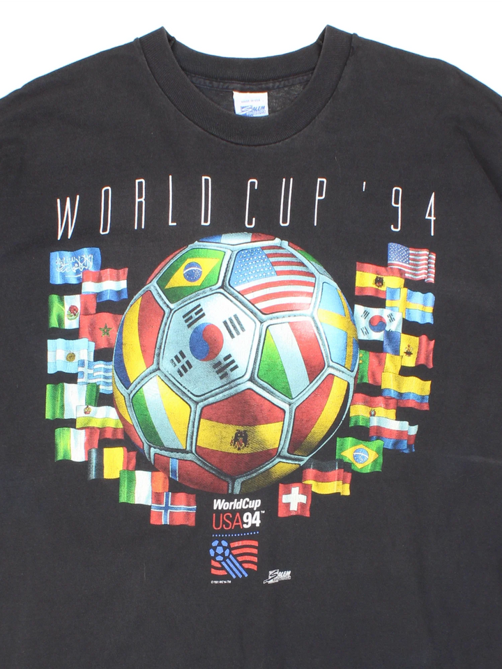 Vintage 1994 USA World Cup T-Shirt in a black colourway, with graphic printed on the front.