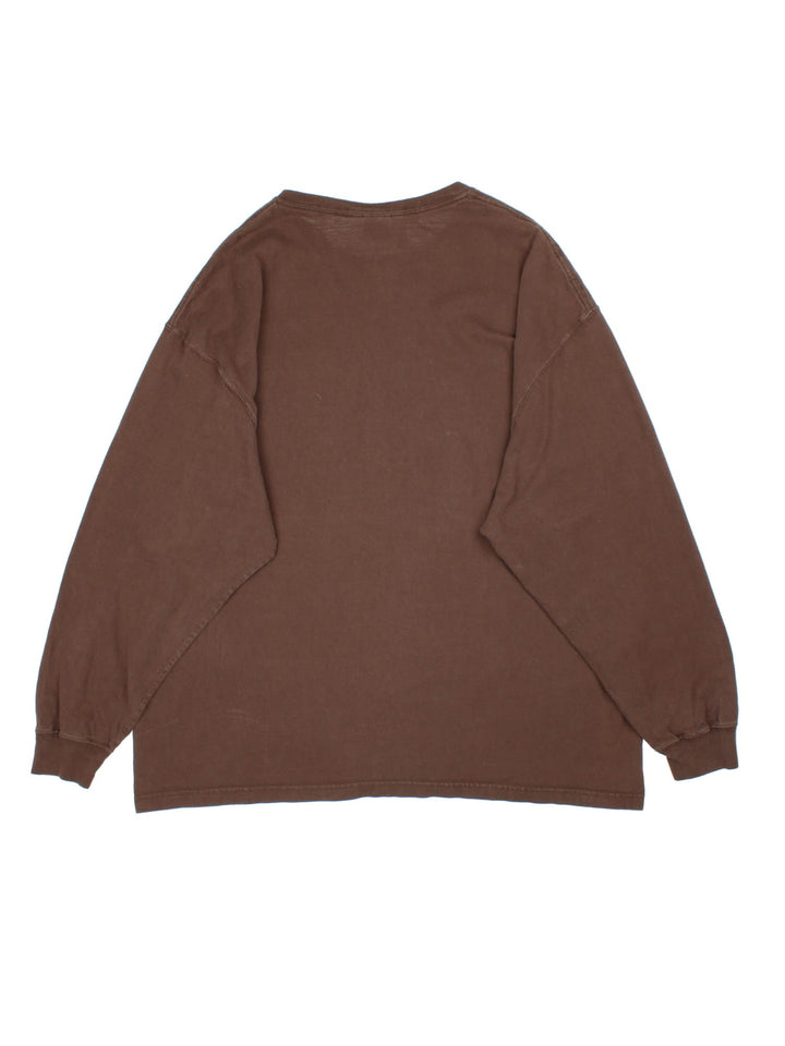 Vintage Carhartt Long Sleeve T-Shirt in a brown colourway, with the logo embroidered on front pocket.