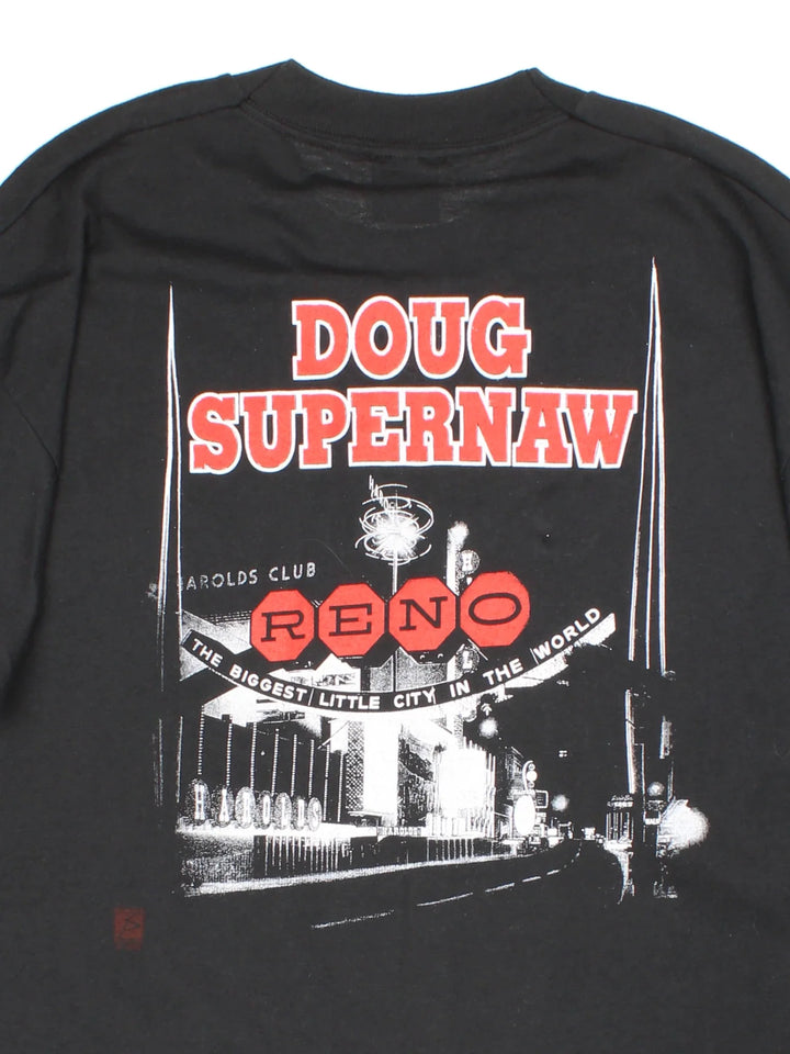 Vintage 1993 Doug Supernaw Graphic T-Shirt in a black colourway with graphic print on the front and spell out on the back.