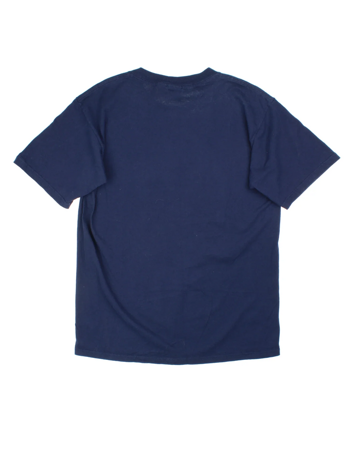 1995 NFL Dallas Cowboys T-Shirt in a blue colourway with large character graphic on the front.