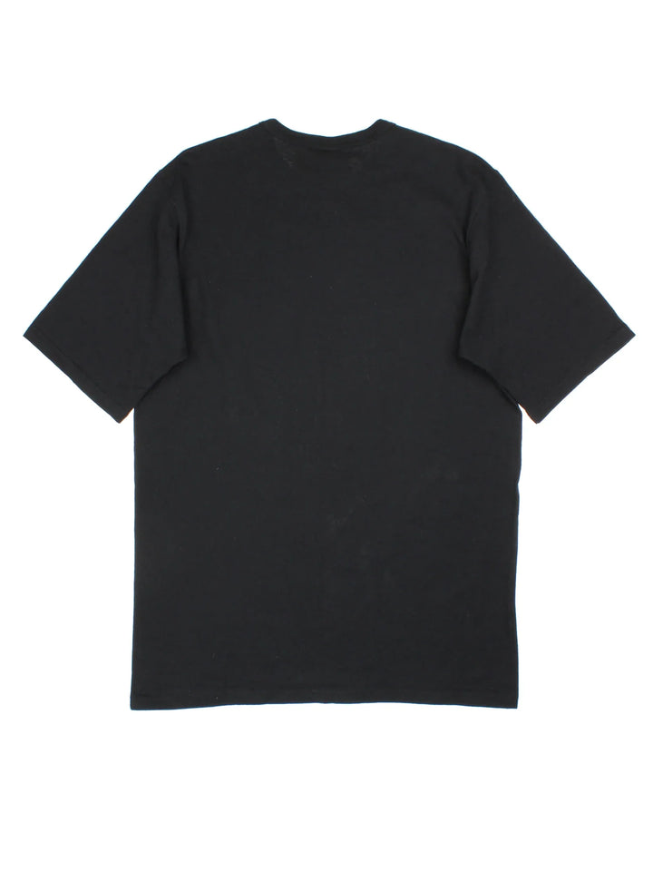 Champion Mushroom Graphic T-Shirt in a black colourway with large graphic on the front and small classic logo on the sleeve.