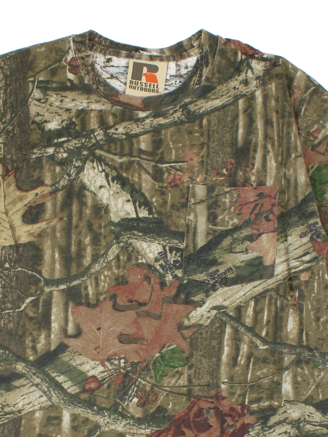 Vintage Russell Athletic Outdoors Camo T-Shirt in a green and brown colourway and has a chest pocket on the front.