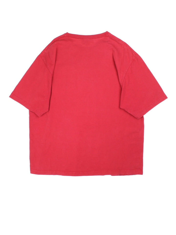 Carhartt T-Shirt in a red colourway with pocket and small classic logo on the front.