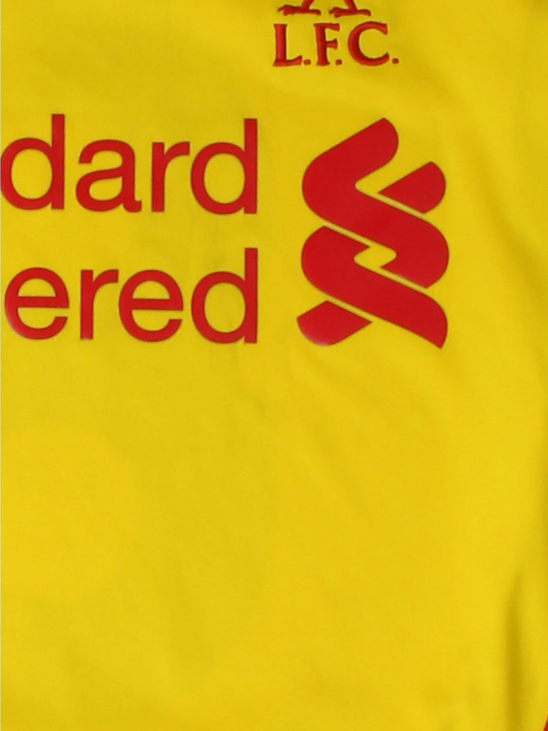 Vintage Liverpool 2014-15 Away Football Shirt in the yellow colourway with Gerrard 8 Legend on the back.
