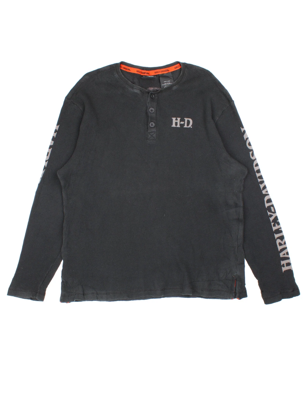 Harley-Davidson Long Sleeve Top in a black colourway with small logo on the chest and along the sleeve. Button up collar with large skull graphic on the back.