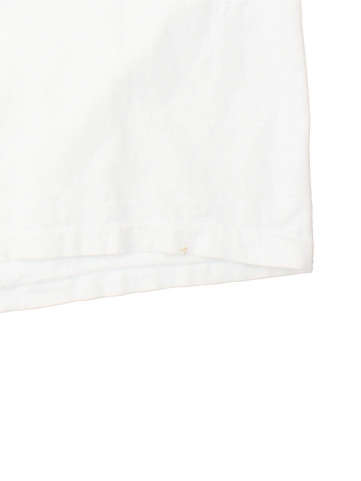 Vintage 1991 Grateful Dead Quality Rock & Roll T-Shirt in a white colourway with small band logo on the front pocket and large graphic on the back.