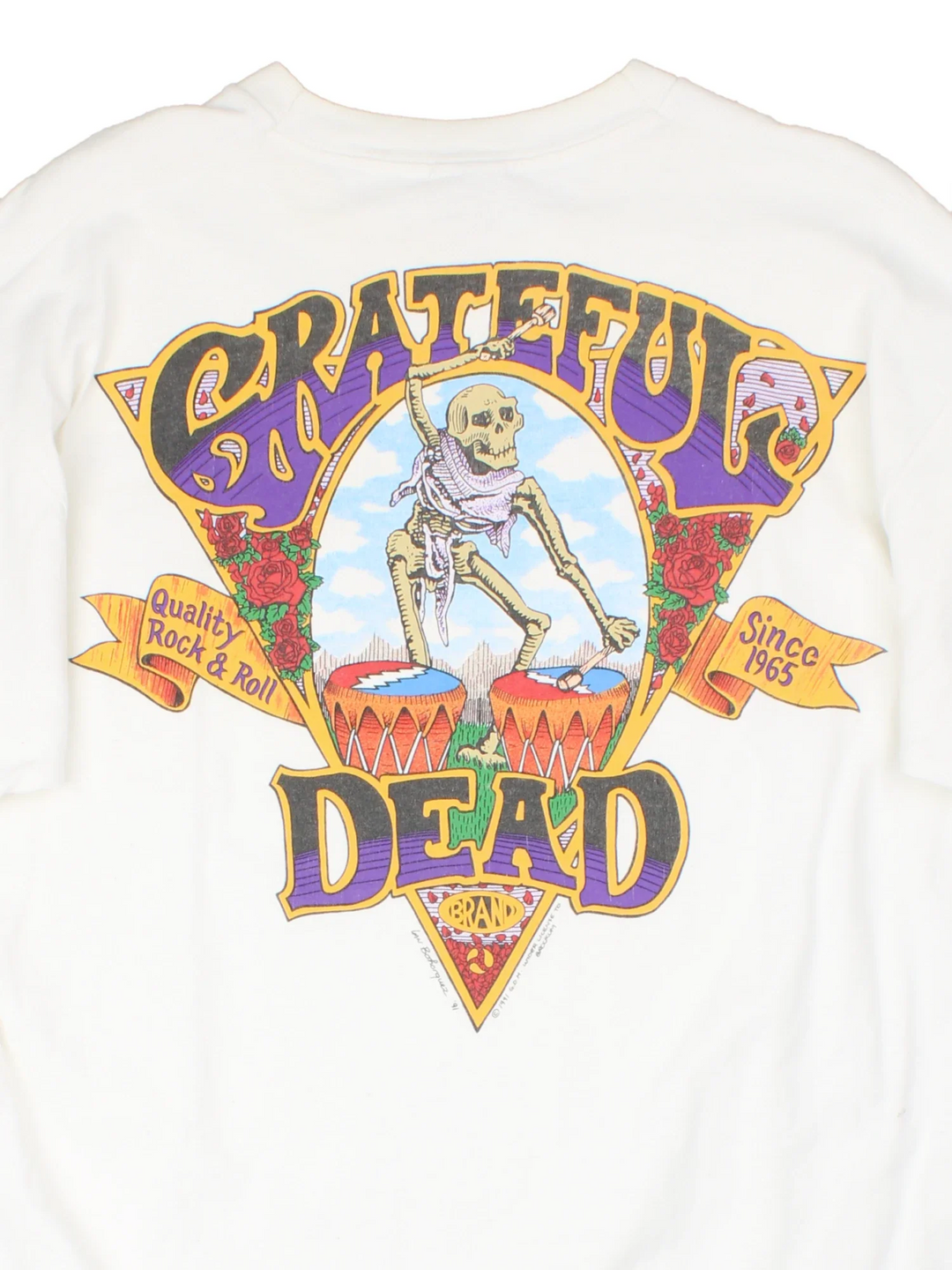 Vintage 1991 Grateful Dead Quality Rock & Roll T-Shirt in a white colourway with small band logo on the front pocket and large graphic on the back.