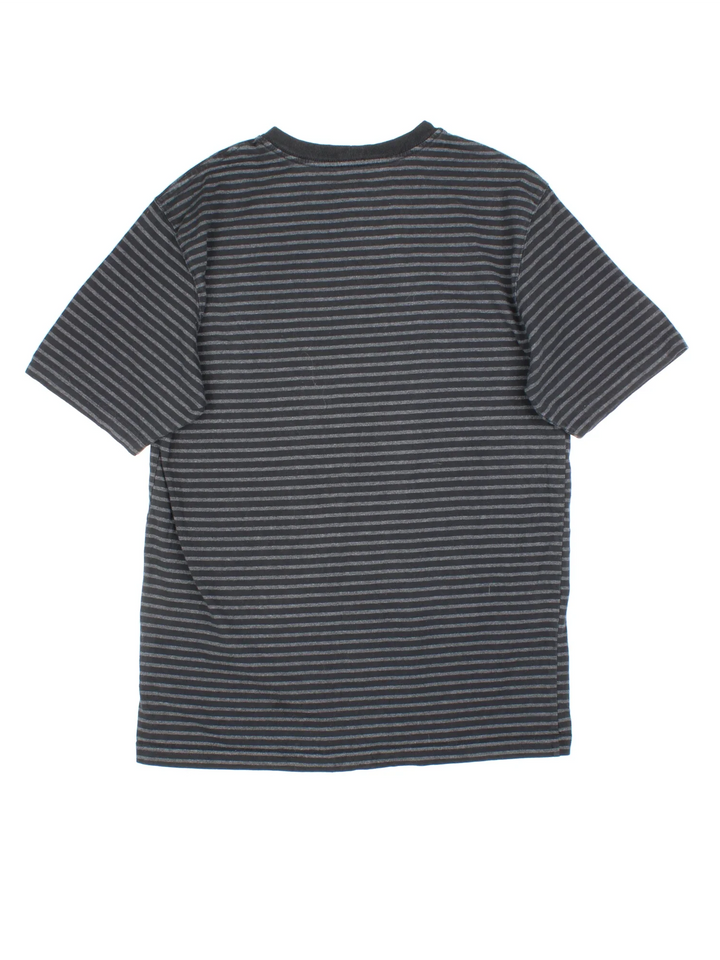 Carhartt T-Shirt in a black and grey striped colourway and has a chest pocket with the logo embroidered on the front.