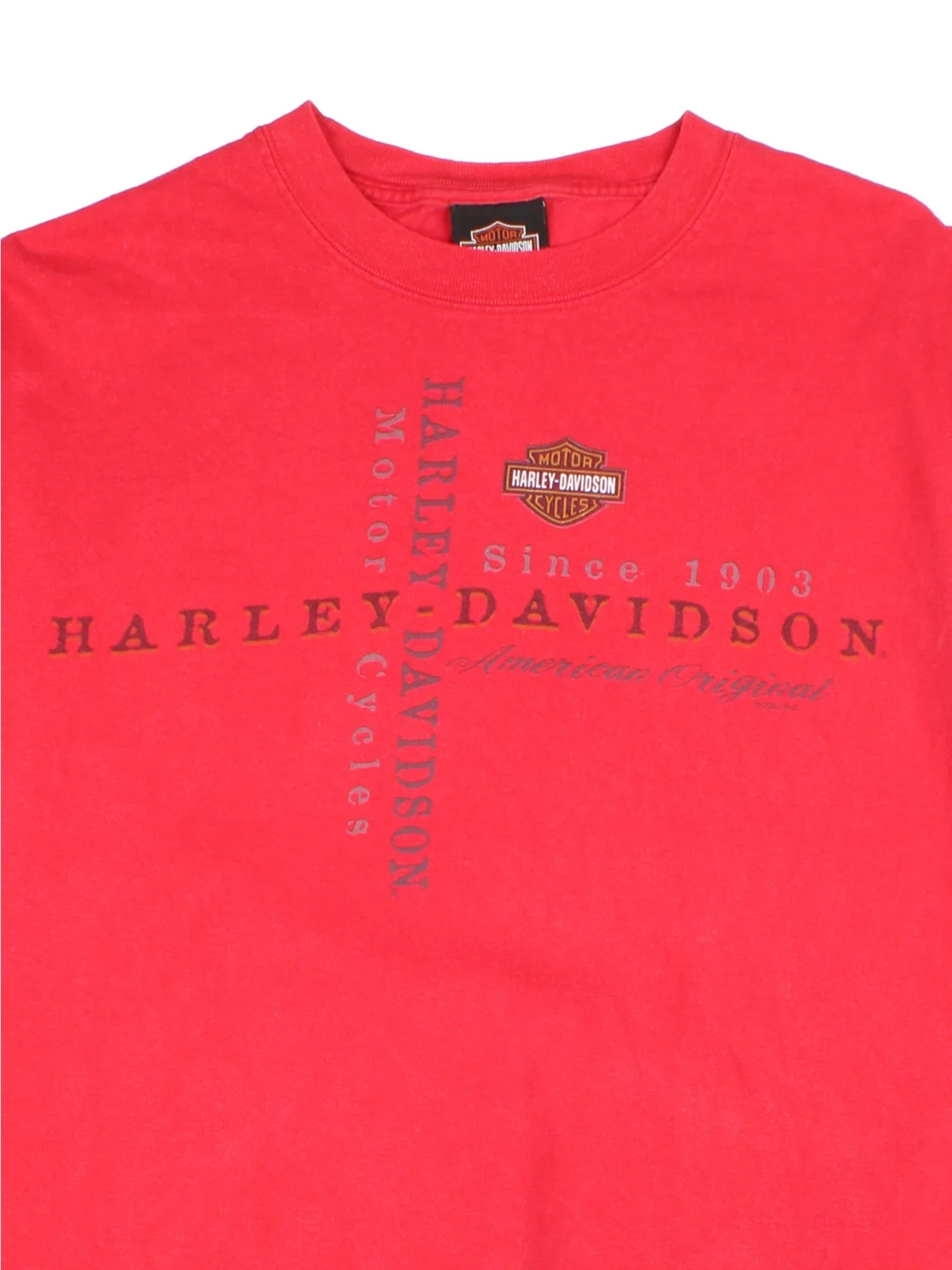 Vintage 2002 Harley-Davidson T-Shirt in a red colourway with brand logo across the front and large graphic on the back..