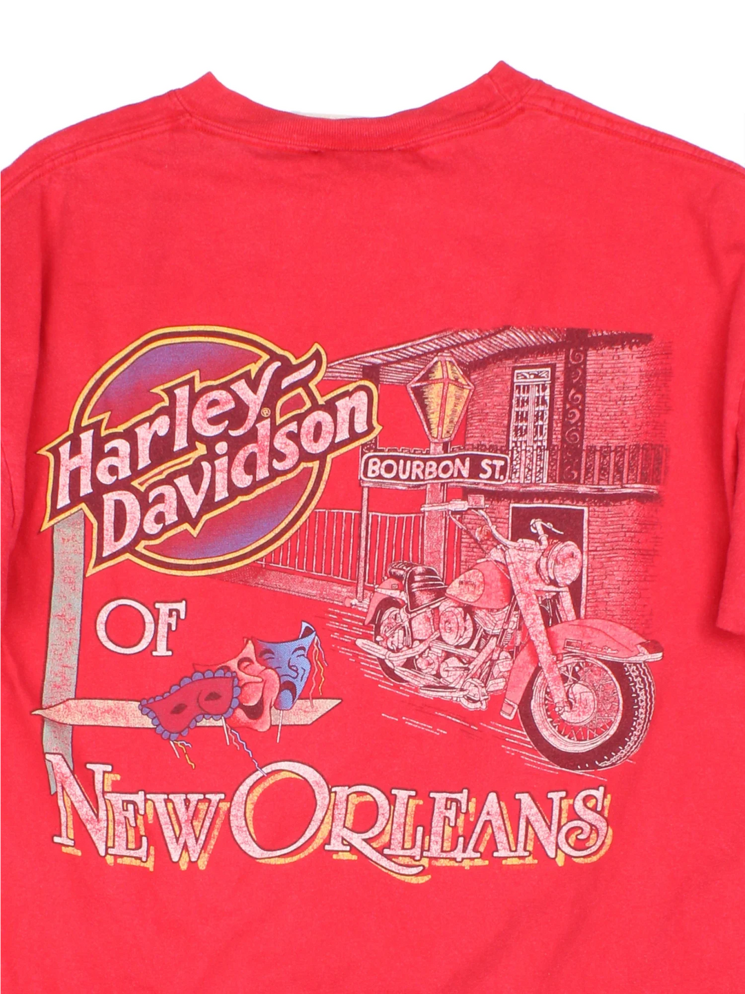 Vintage 2002 Harley-Davidson T-Shirt in a red colourway with brand logo across the front and large graphic on the back..