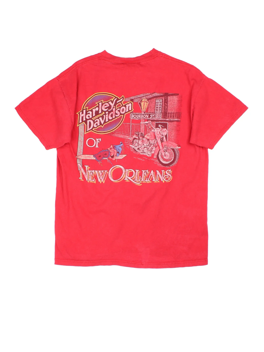 Vintage 2002 Harley-Davidson T-Shirt in a red colourway with brand logo across the front and large graphic on the back..