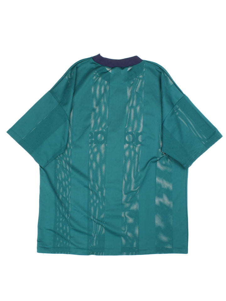 Vintage Stripe Mesh Adidas T-Shirt in a green colourway with spellout logo on the front.