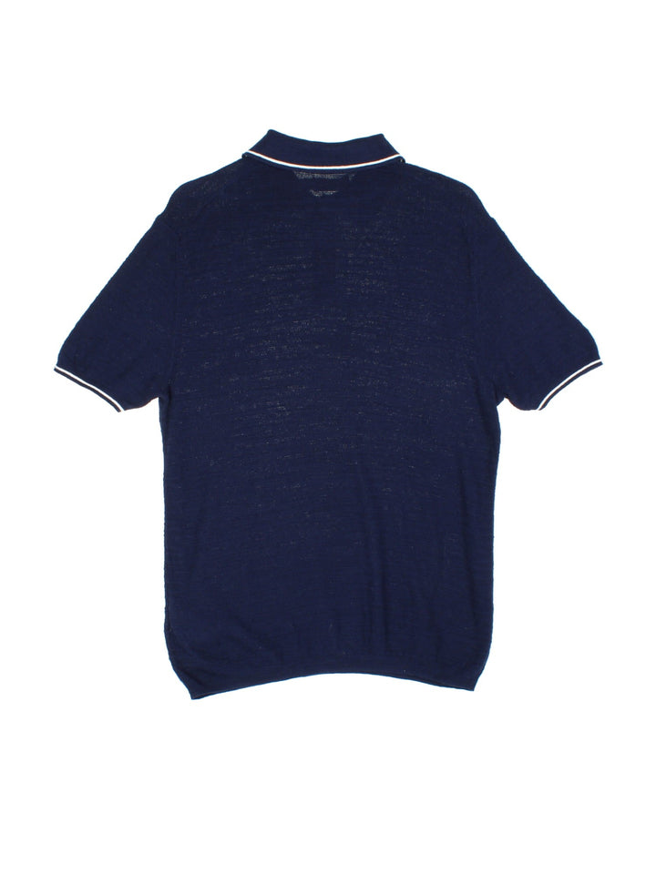 Vintage Polo Ralph Lauren Knitted Polo Shirt in a blue colourway, with x3 button fastening and embroidered front logo.