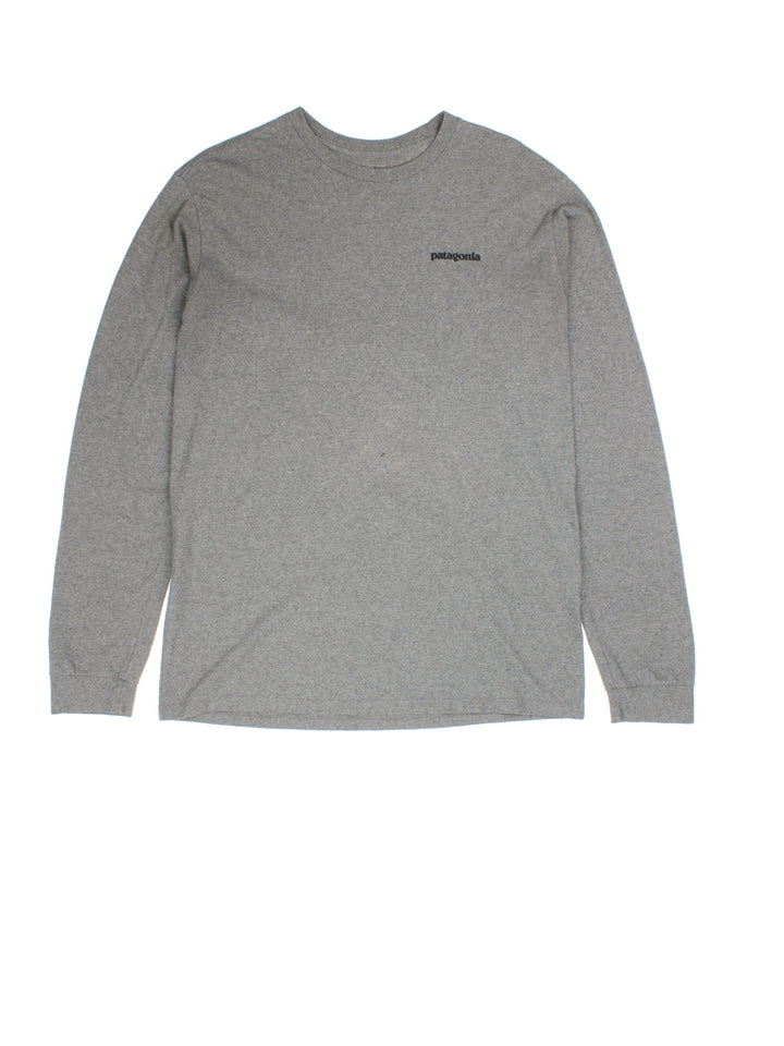 Vintage Patagonia Long Sleeve T-Shirt in a grey colourway with the logo on front and back.