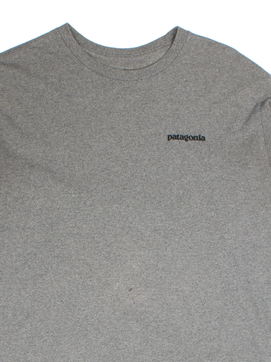 Vintage Patagonia Long Sleeve T-Shirt in a grey colourway with the logo on front and back.