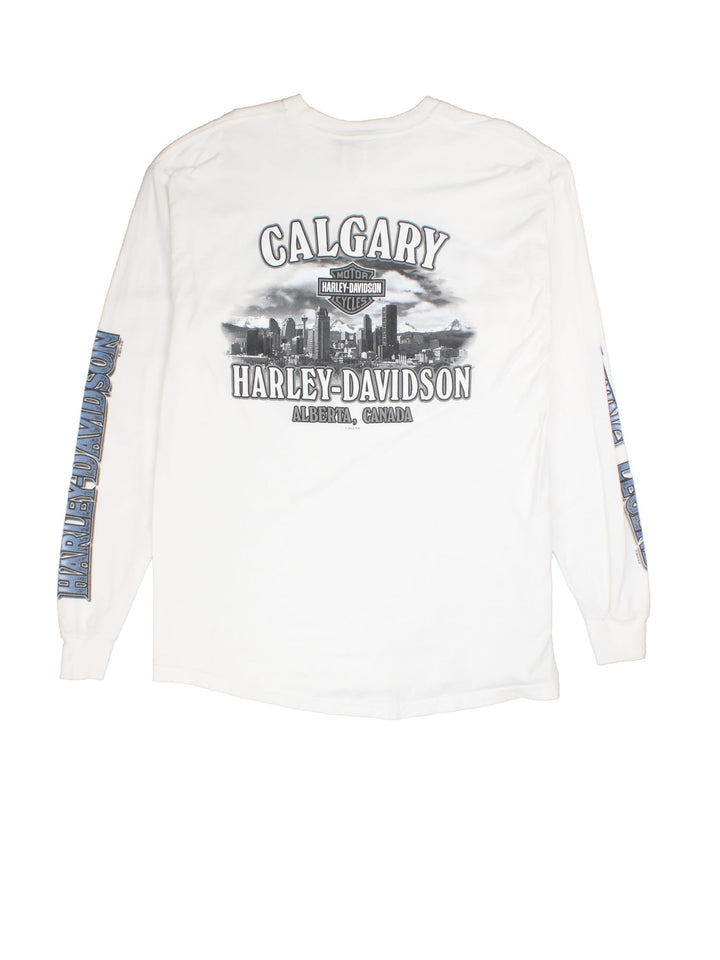 Vintage Harley-Davidson Calgary Long Sleeve T-Shirt in a white colourway with the logo on front/back and sleeves.