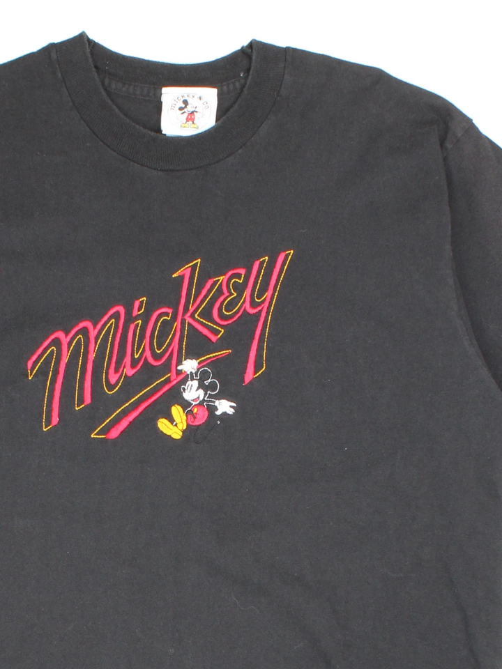 Vintage Disney Mickey Mouse T-Shirt in a black colourway with logo and cartoon graphic on the front