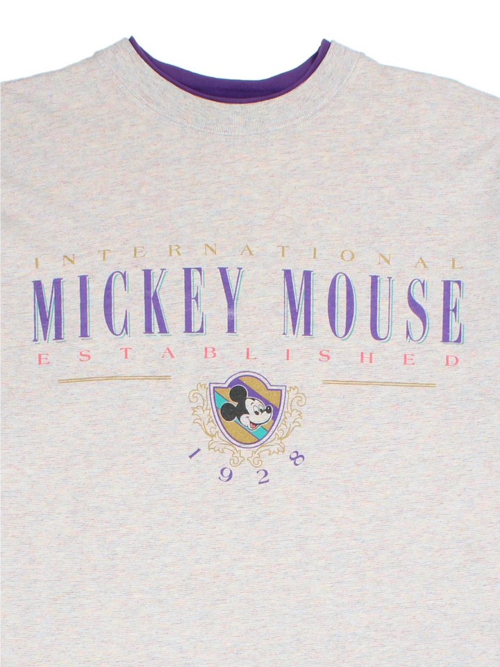 Vintage Disney Mickey Mouse T-Shirt in a grey colourway with the logo printed on the front and a purple trim around the collar.