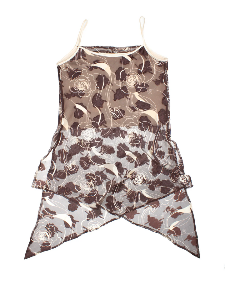 Vintage Dress in a brown colourway with floral patterns all over.