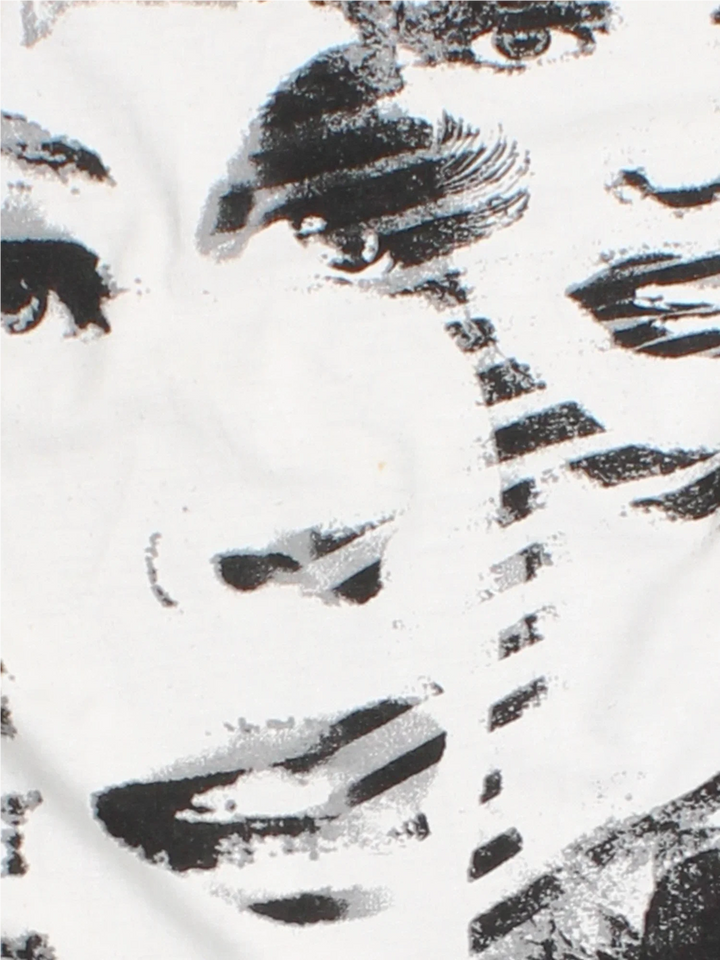 Y2K Abstract Faces Mesh Top in a black and white colourway.
