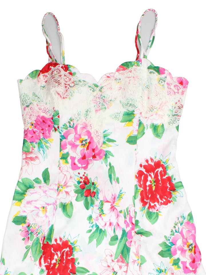 Vintage Y2K Victorias Secret Dress in a white/multi colourway. Lace and bead detailing and high leg split.
