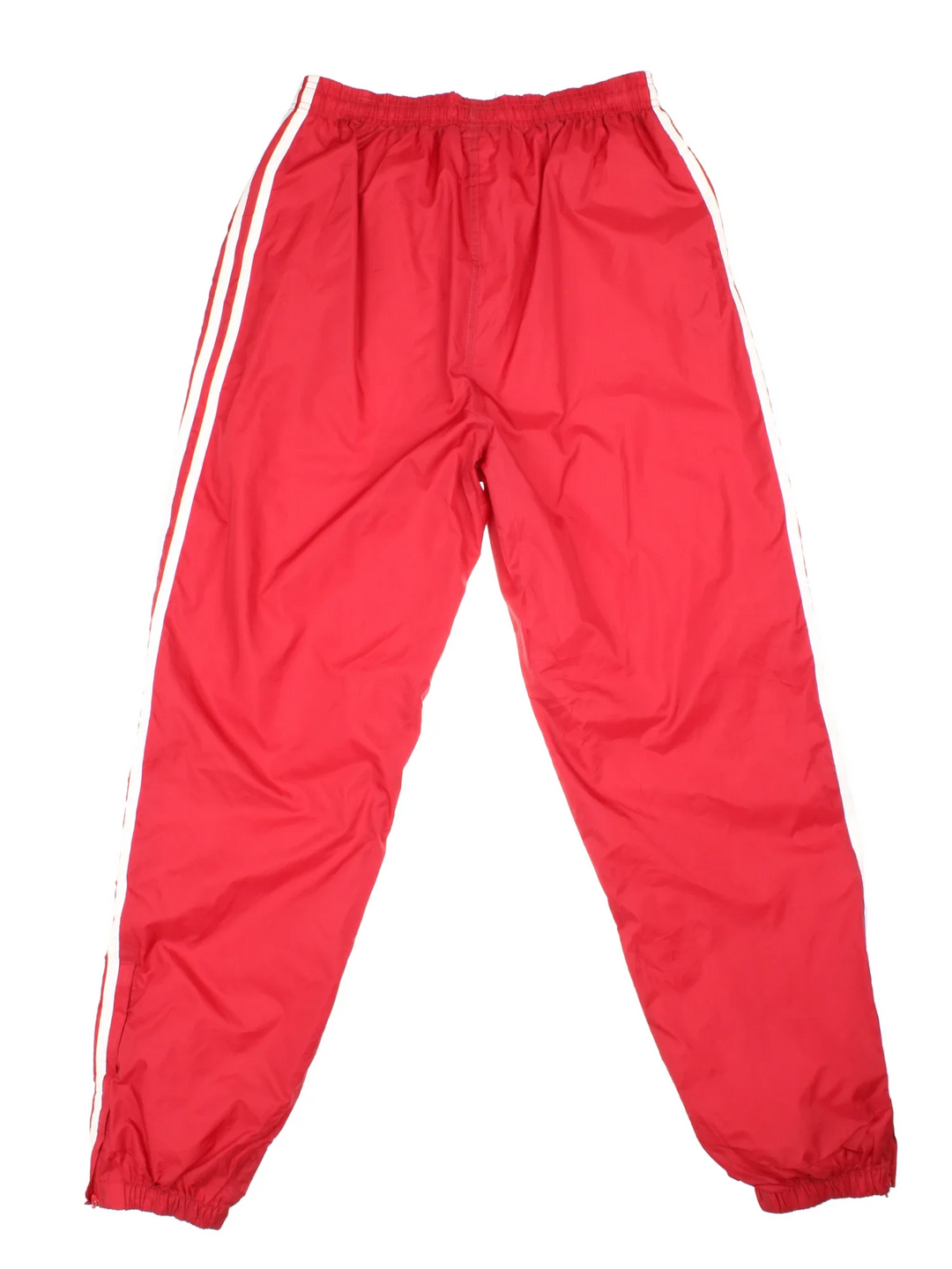 Adidas Tracksuit Bottoms in red colourway. Side pockets, classic contrast x3 stripe branding and the logo embroidered on the front.