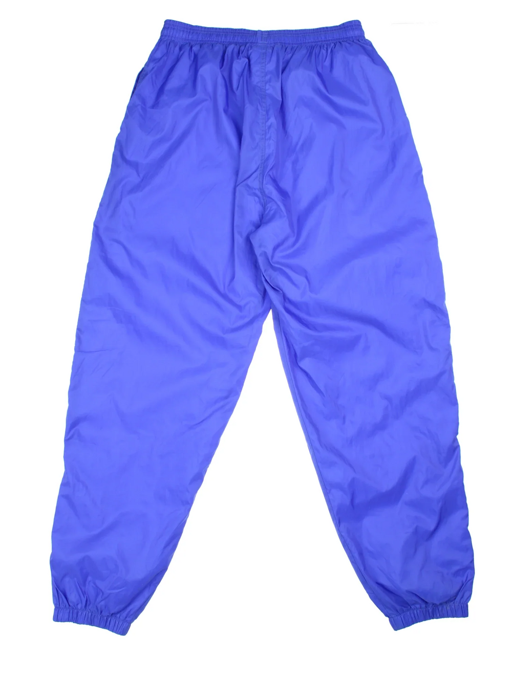 Adidas Tracksuit Bottoms in blue colourway. Side pockets, elasticated waist and the logo embroidered on the front.