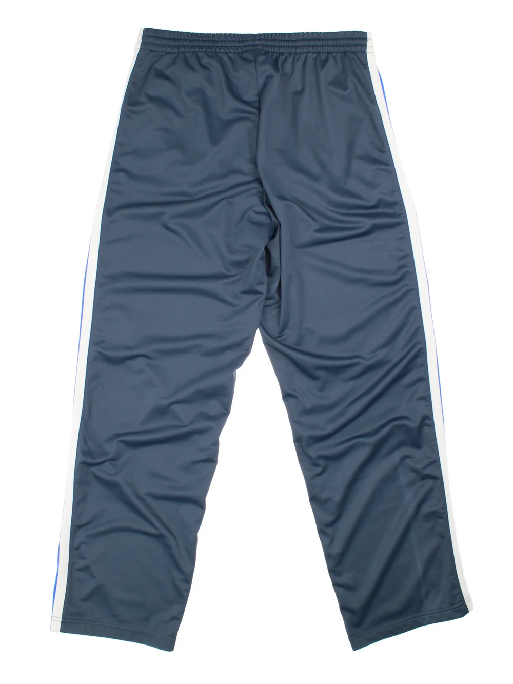 90's Fila Tracksuit Bottoms in blue colourway. Side pockets, contrast piping and the logo embroidered on the front.