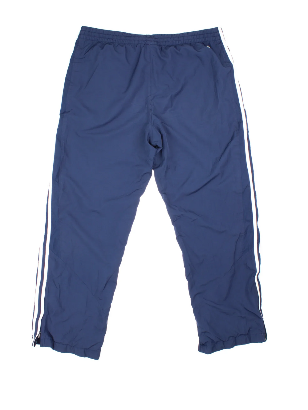 90's Adidas Tracksuit Bottoms in blue colourway. Side pockets, elasticated waist and the logo embroidered on the front.