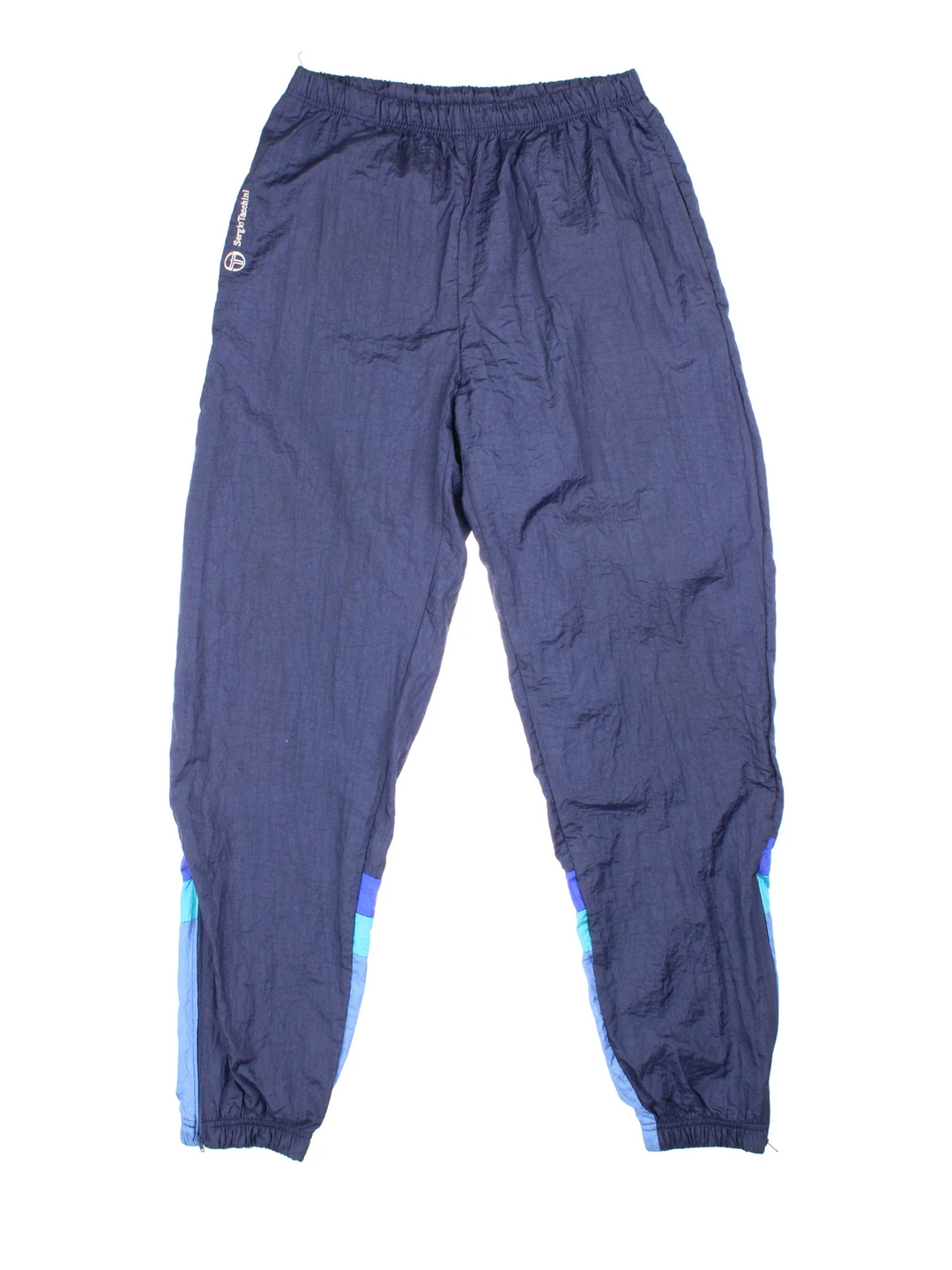 90's Sergio Tacchini Tracksuit Bottoms in blue colourway. Side pockets, elasticated waist and the logo embroidered on the front.