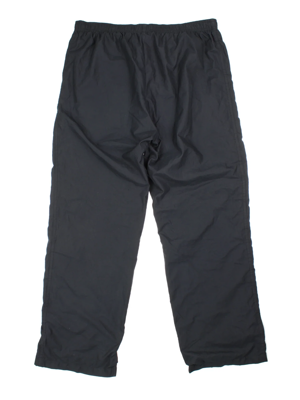 90's Nike Tracksuit Bottoms in black colourway. Side pockets, elasticated waist and the logo embroidered on the front.