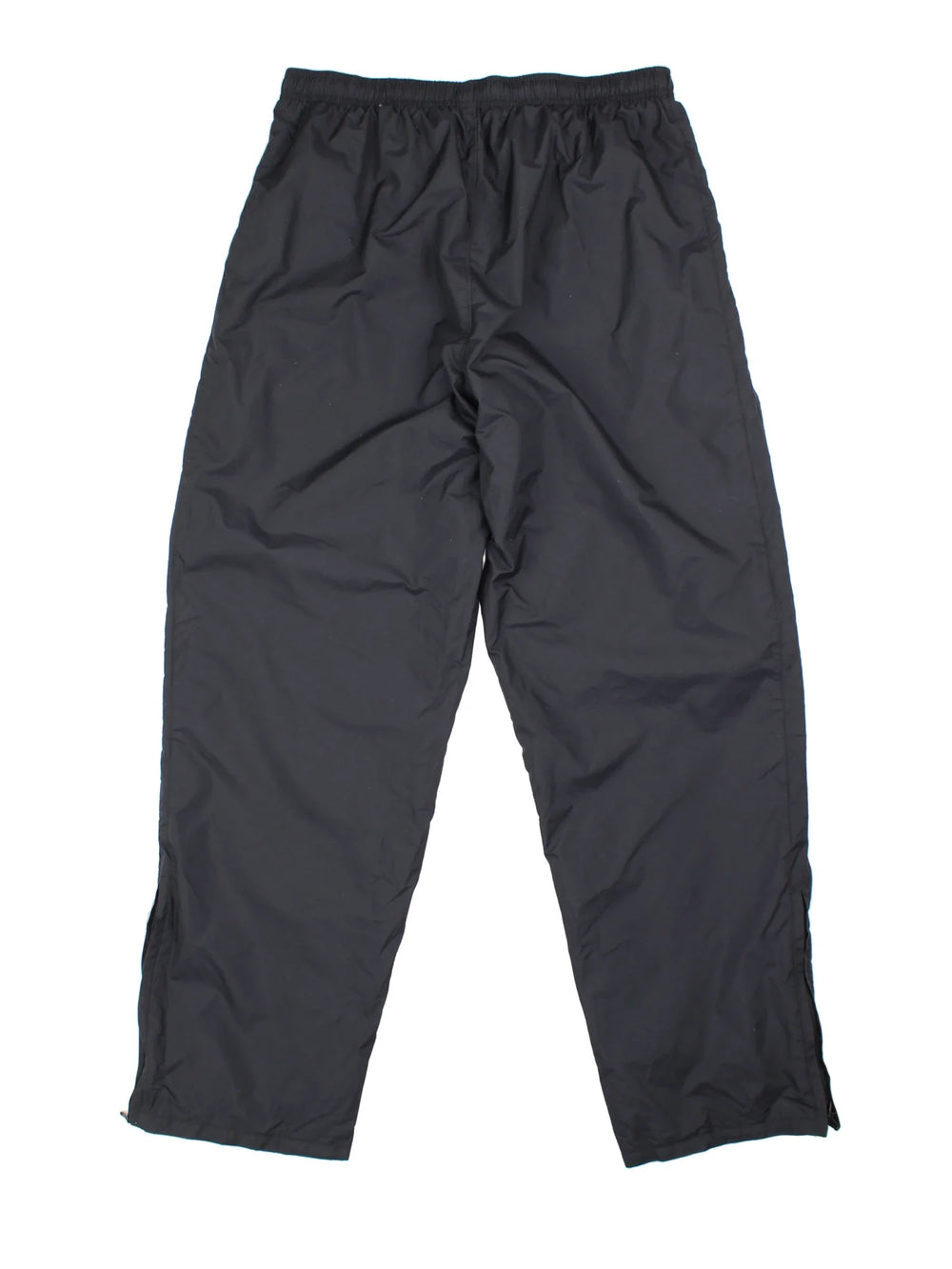 90's Nike Tracksuit Bottoms in black colourway. Side pockets, elasticated waist and the logo embroidered on the front.