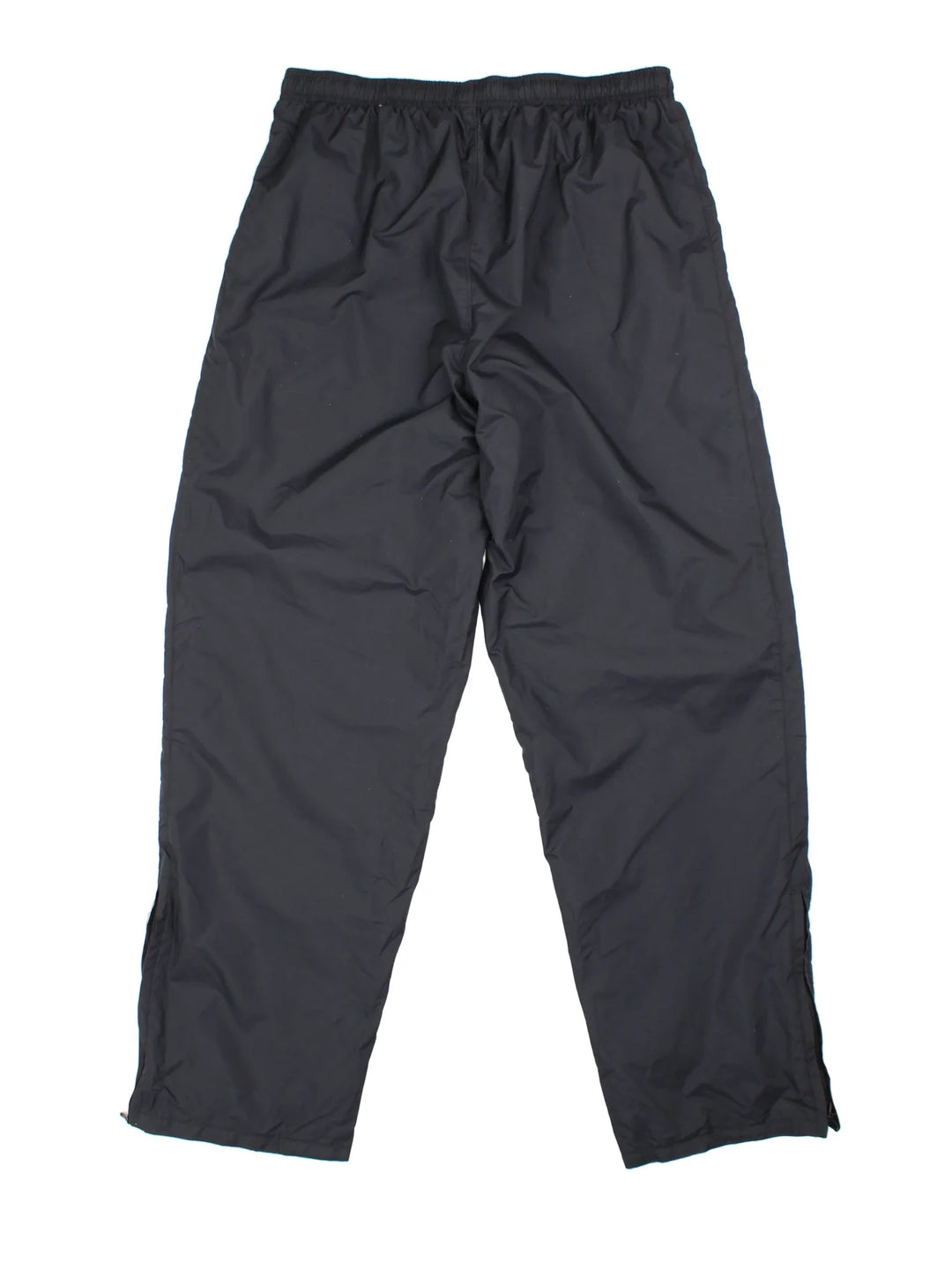 90's Nike Tracksuit Bottoms in black colourway. Side pockets, elasticated waist and the logo embroidered on the front.