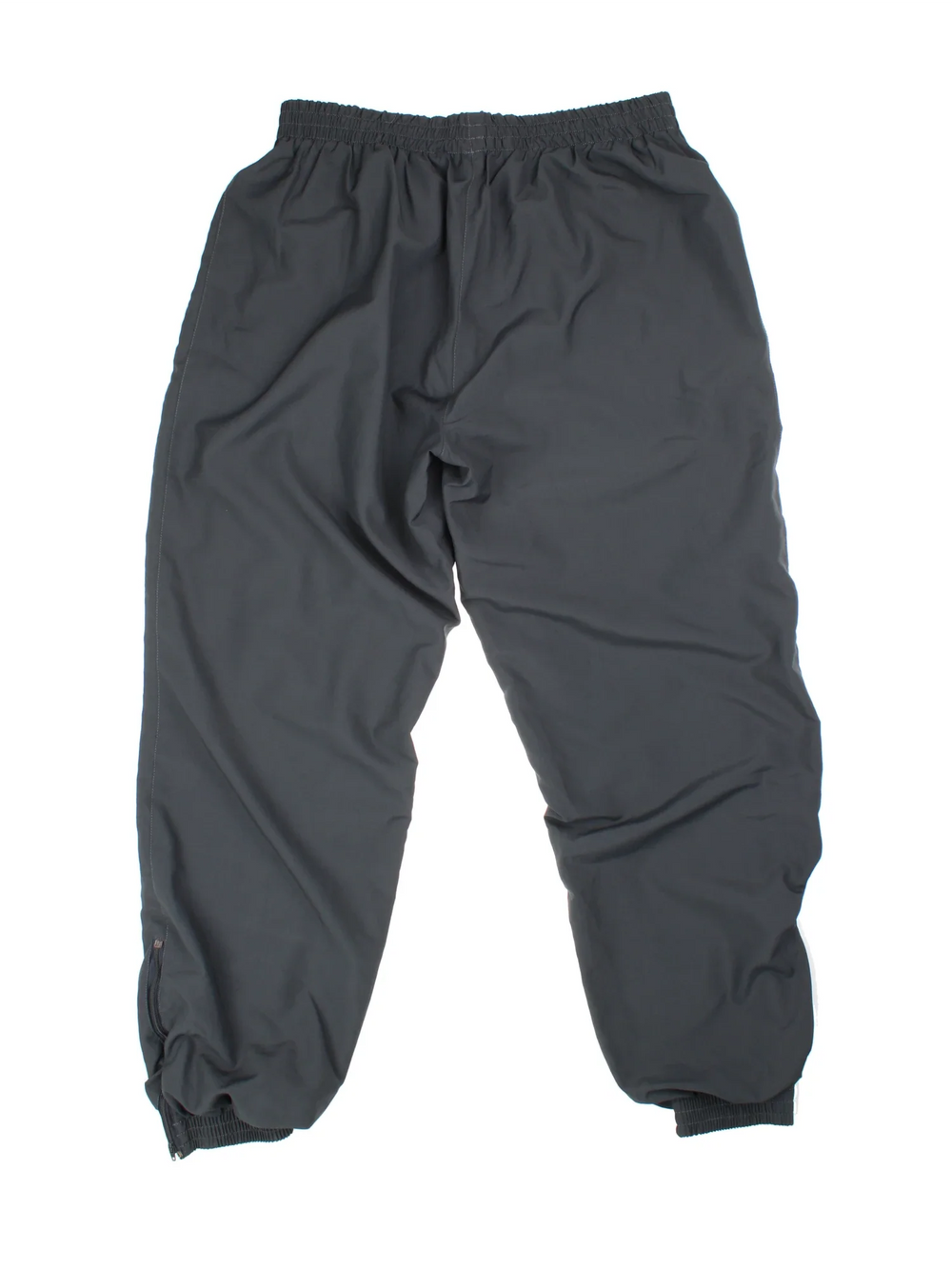 90's Puma Tracksuit Bottoms in black colourway with cuffed hem. Zipper ankle leg, side zip pockets and the logo embroidered on the front.
