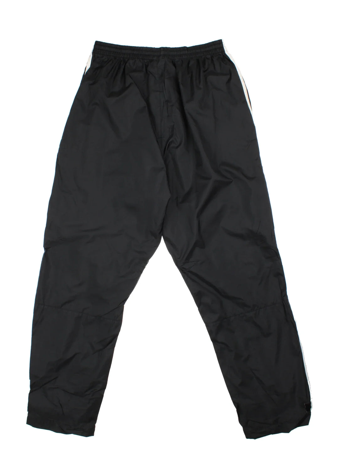 Vintage Adidas Tracksuit Bottoms in a black colourway with the iconic three stripes down the sides, has pockets, adjustable velcro straps by the cuffs, mesh lining, and the logo embroidered on the front.