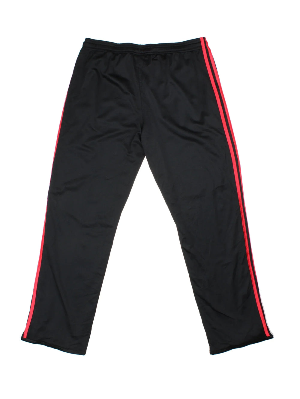 Adidas Pleated Tracksuit Bottoms in a black colourway with the iconic three stripes down the sides in red, has pockets, elasticated waist with drawstring, and the logo embroidered on the front.