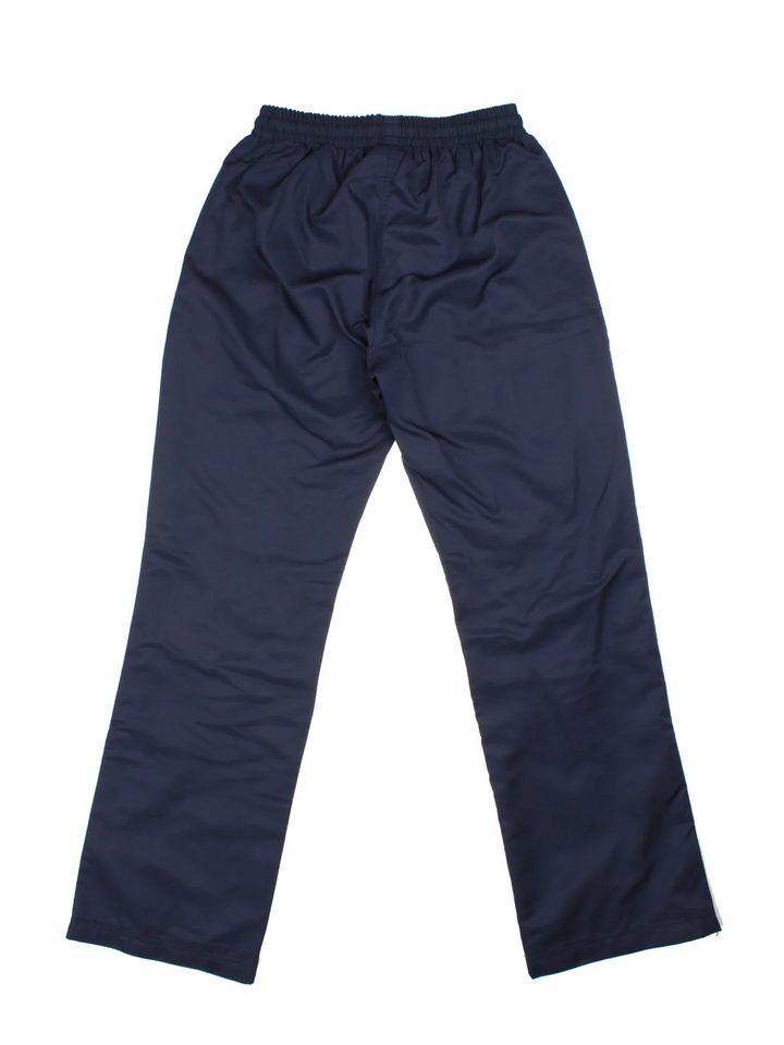 Y2K Nike Tracksuit Bottoms in a blue colourway with pockets, elasticated waist with drawstring, and has the logo embroidered on the front.