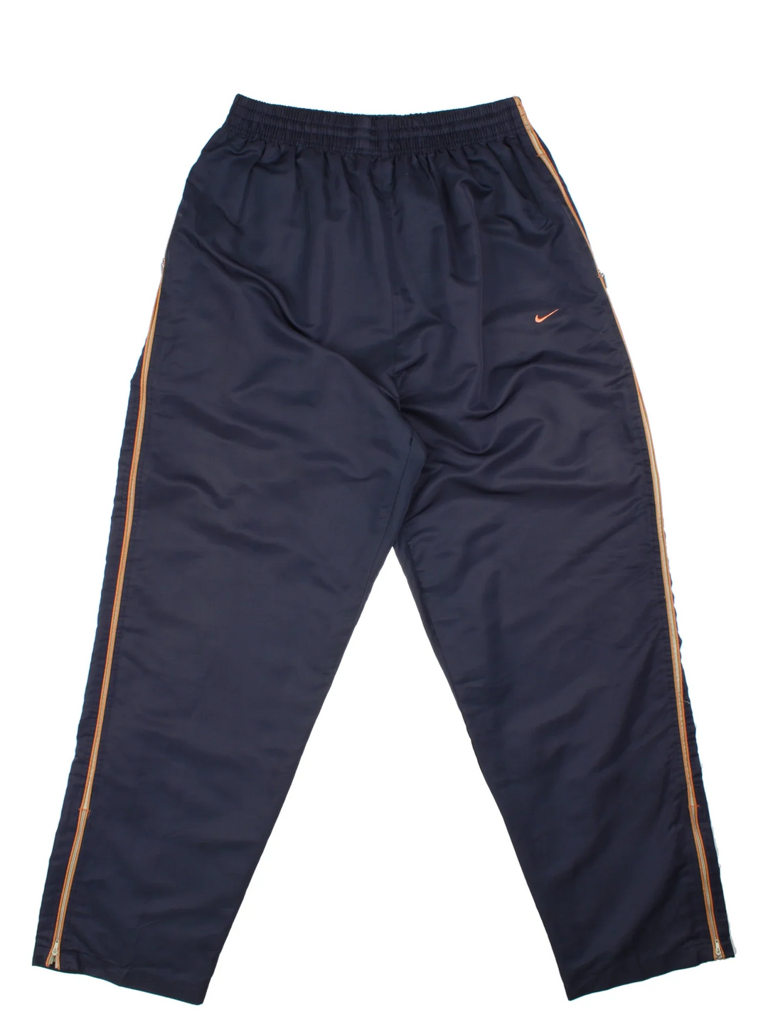 Vintage Nike Tracksuit Bottoms in a blue colourway with orange stripes going down the sides, has side pockets, elasticated waist with drawstring, and the logo embroidered on the front.